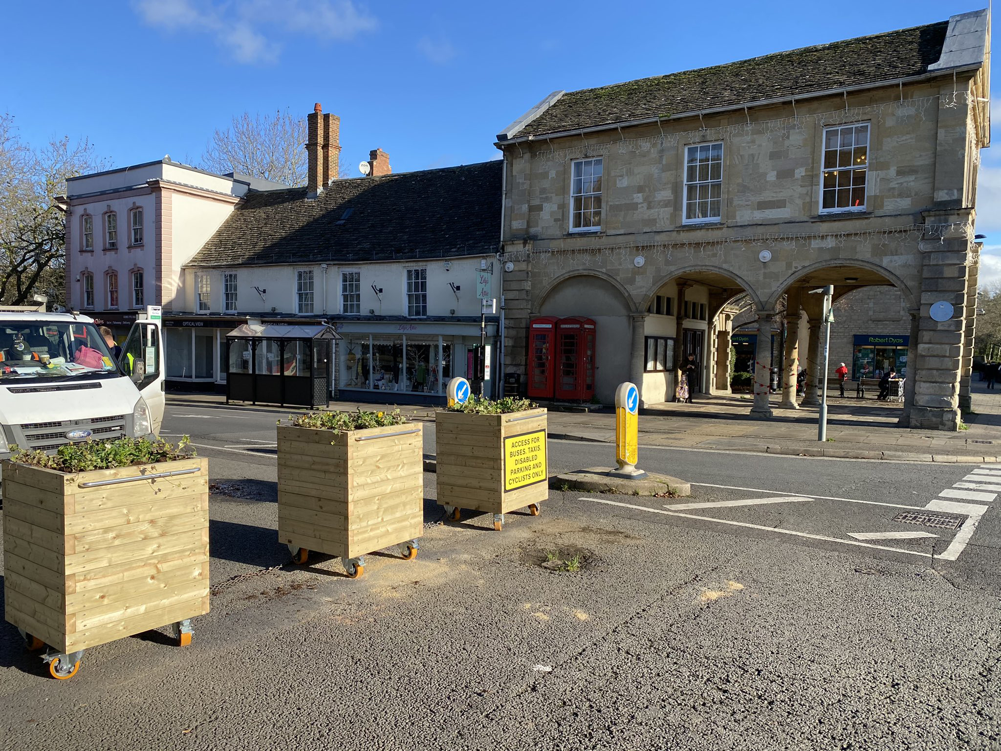 Large wooden planters on wheels in use by Witney Town Council